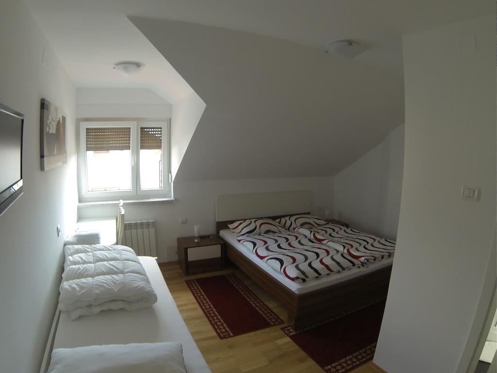 Rooms & Apartment Mira G. Postojna Habitación foto